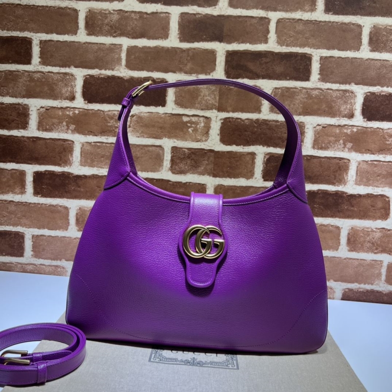 G*u*i top handle bags